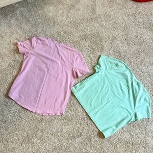 Lululemon workout shirts in pastel Pink and Mint